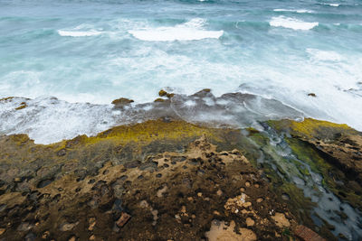 High angle view of rocks on beach