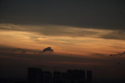 View of cityscape at sunset