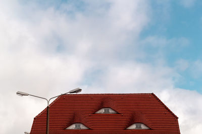 Roof sky and clouds