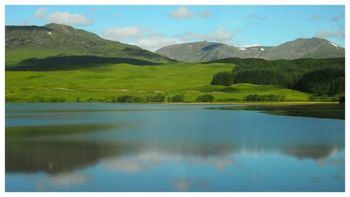 Scenic view of lake and mountains