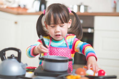 Portrait of cute girl at home