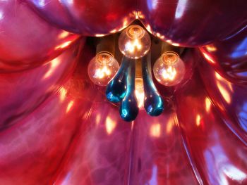 Close-up of illuminated lighting equipment