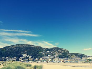 View of beach against blue sky