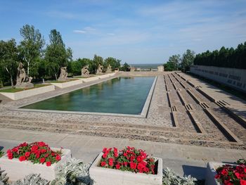 Scenic view of pond against sky