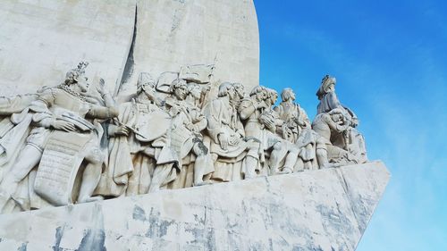 Low angle view of statue against sky