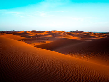 Scenic view of desert against sky