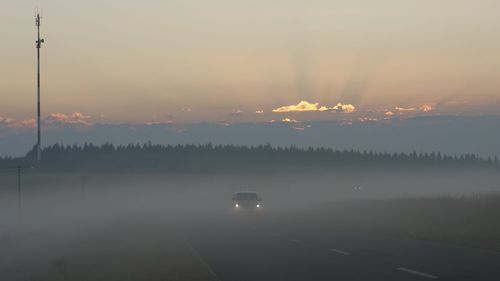 Scenic view of silhouette landscape against sky during sunset