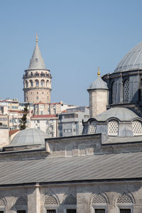 Low angle view of buildings against clear sky