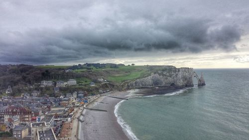 Scenic view of sea against cloudy sky