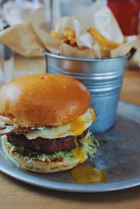 Close-up of burger in plate on table