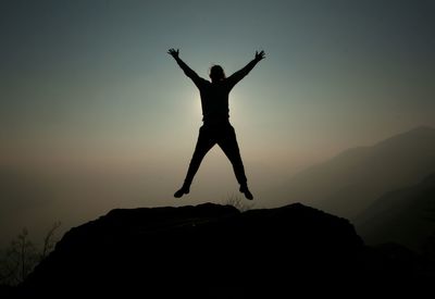 Woman jumping in mid-air