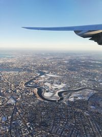 Aerial view of city against sky