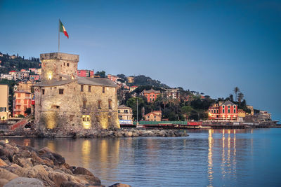 Italian castle at twilight - rapallo - genoa - italian riviera by night