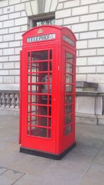 Close-up of red telephone booth