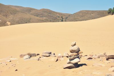 Scenic view of desert against sky