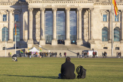 People in front of historical building