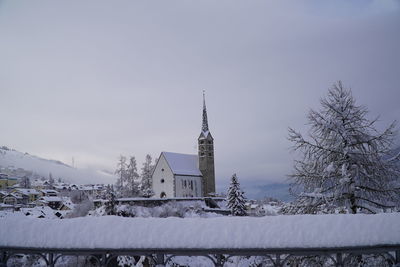 Buildings against sky during winter