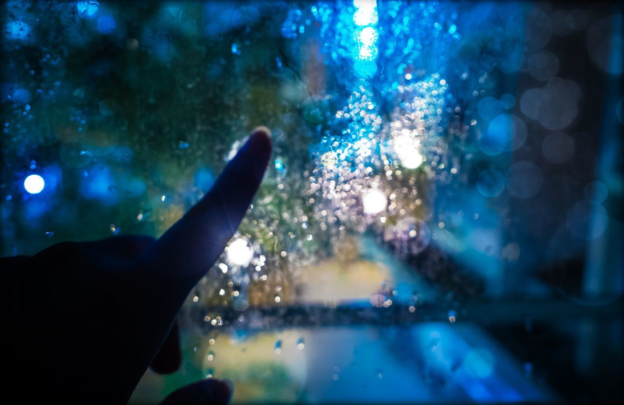 human hand, one person, hand, real people, human body part, water, glass - material, unrecognizable person, window, nature, body part, finger, transparent, lifestyles, human finger, outdoors, leisure activity, night