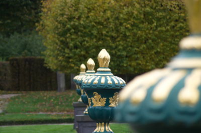 Close-up of statue against trees