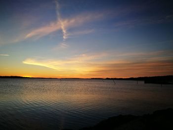 View of calm sea at sunset