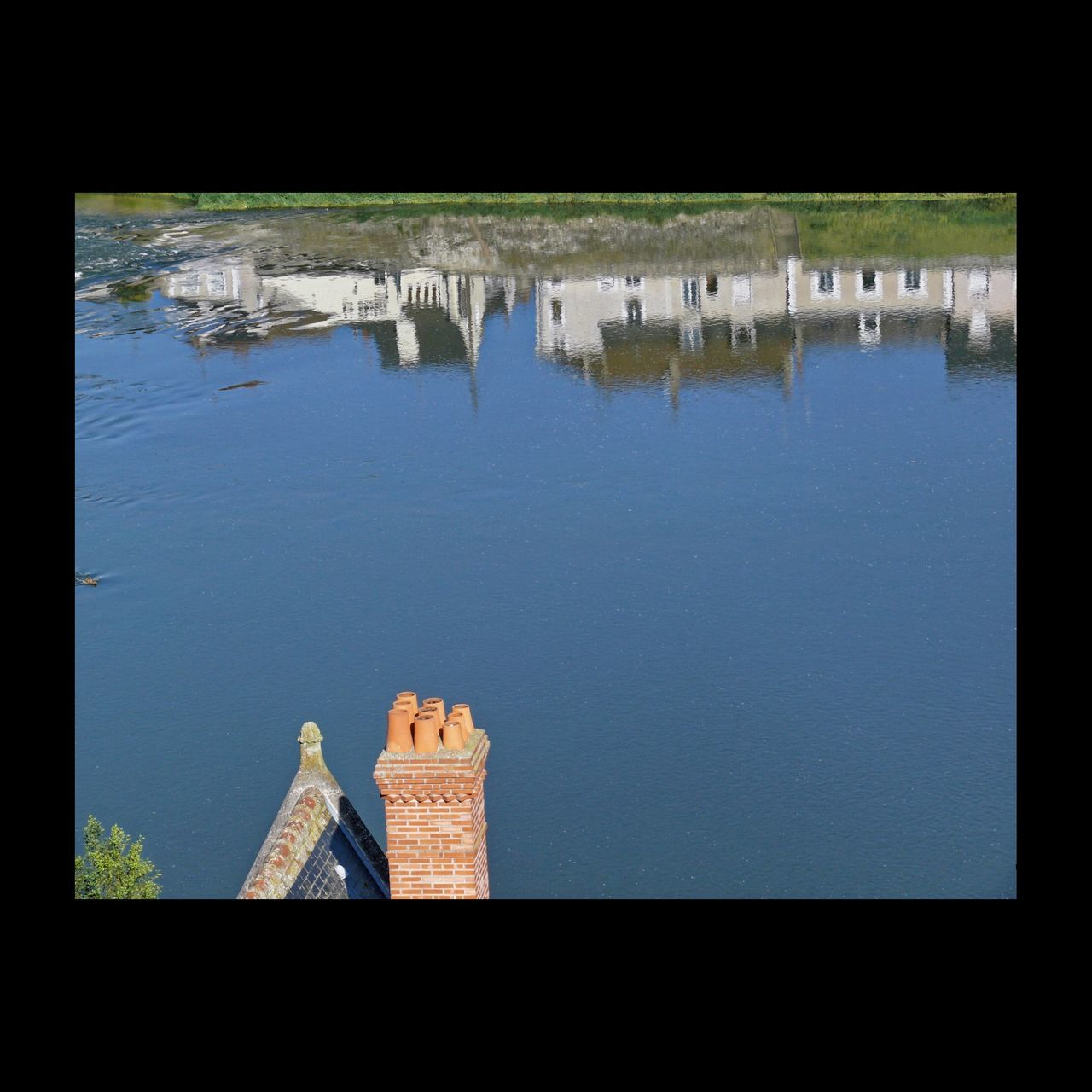 water, architecture, built structure, building exterior, reflection, lake, waterfront, transfer print, auto post production filter, no people, outdoors, river, day, sky, nautical vessel, nature, high angle view, religion, harbor, place of worship