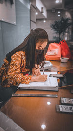 A girl who is writing about life