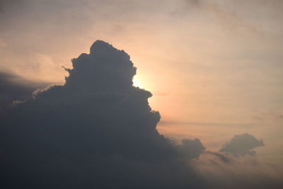 Low angle view of silhouette cloud against sky during sunset