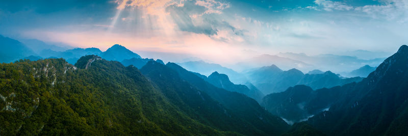 Panoramic view of mountains against sky during sunset