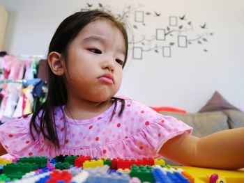 Portrait of cute girl at home