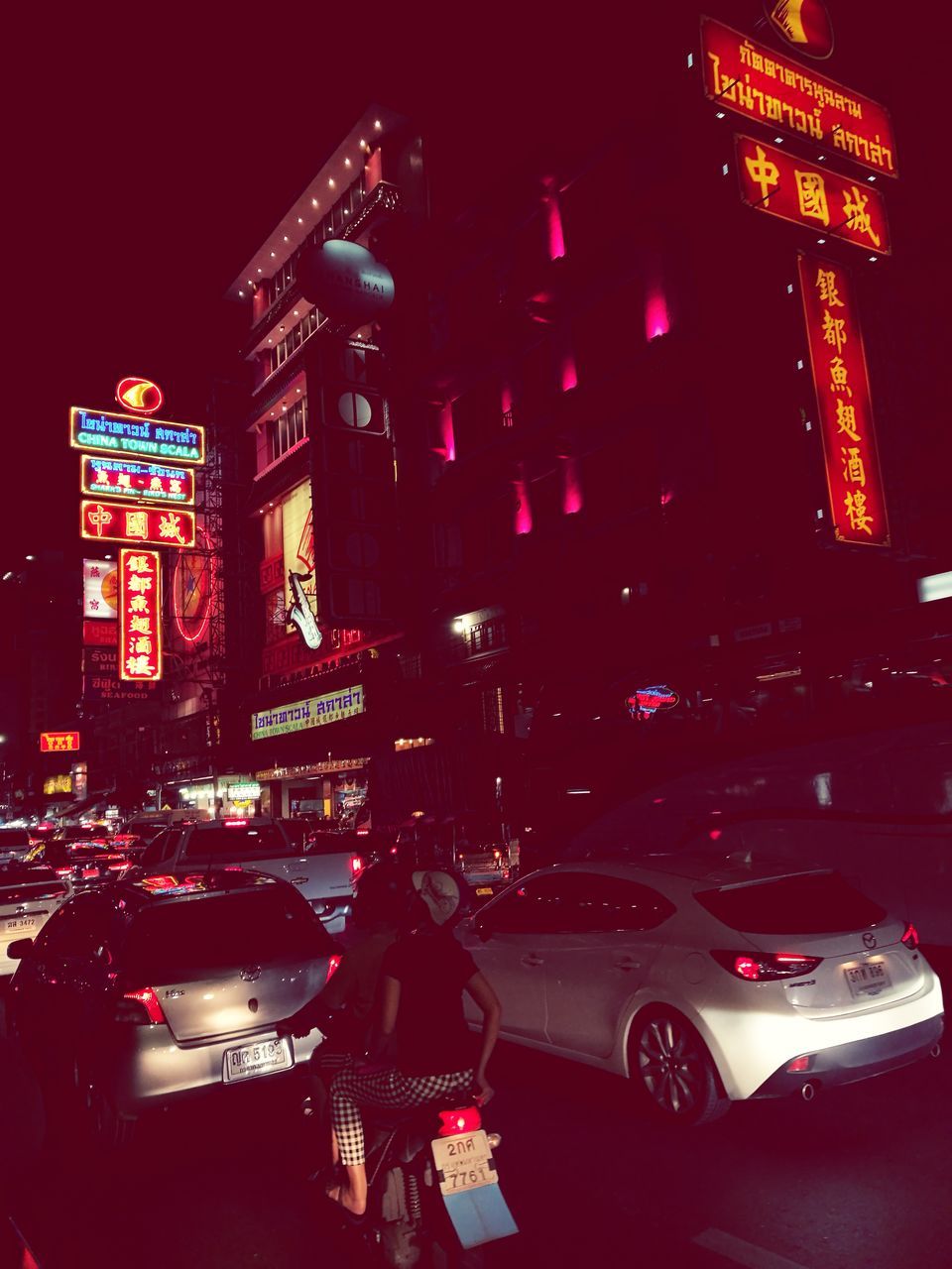 illuminated, night, car, architecture, land vehicle, building exterior, built structure, red, transportation, outdoors, no people, neon, city