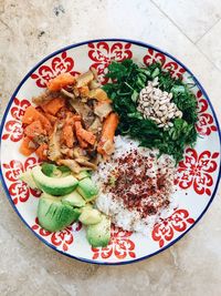 High angle view of fruits in plate on table