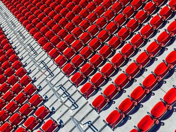 High angle view of red seats at stadium