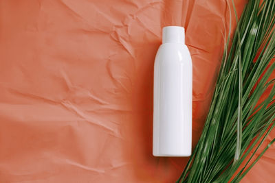 High angle view of bottle on table