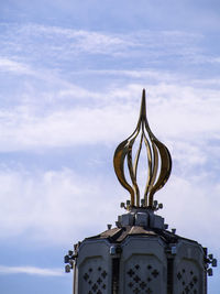 Low angle view of statue against sky