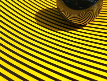 Full frame shot of yellow pattern on table at home