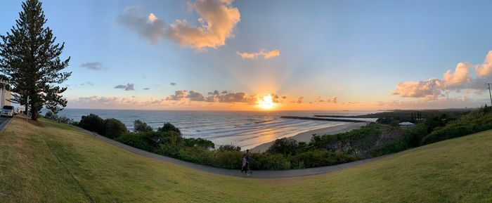 Panoramic view of sea against sky during sunset