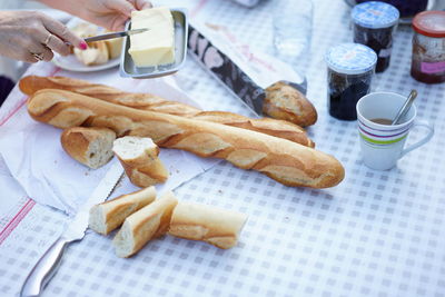 Cropped image of hands preparing food