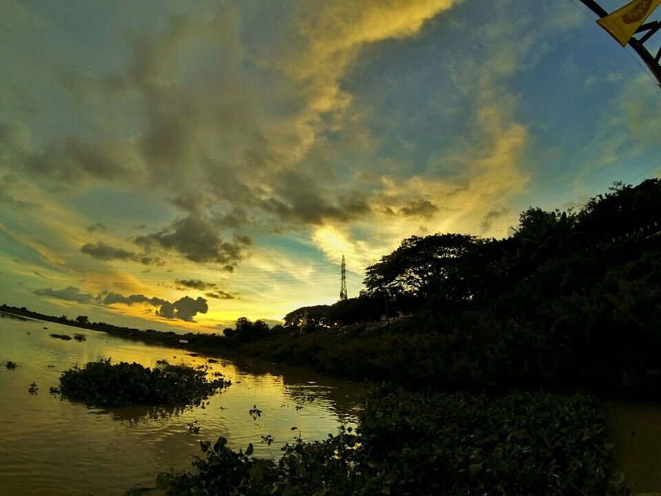 sunset, sky, water, tree, tranquil scene, scenics, tranquility, beauty in nature, cloud - sky, reflection, nature, idyllic, cloud, lake, orange color, silhouette, river, cloudy, waterfront, outdoors