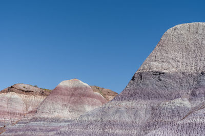 Landscape of barren purple badlands at blue mesa in petrified forest national park in arizona