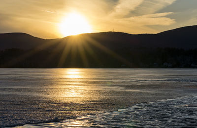 Scenic view of mountains against sky during sunset