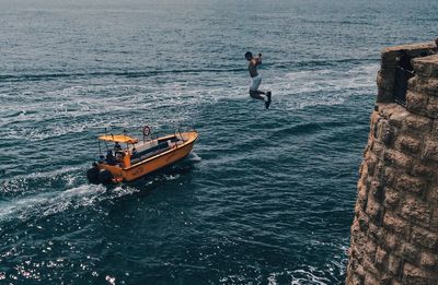 Boat sailing in sea