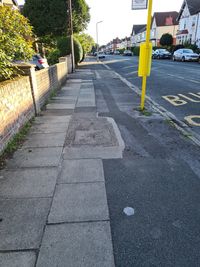 Surface level of road sign on footpath