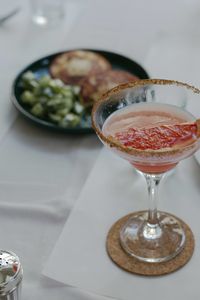 High angle view of wine in glass on table