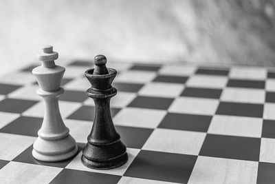 Close-up of chess pieces on board