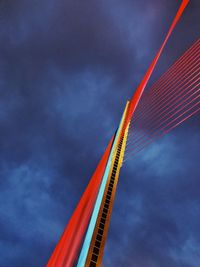 Low angle view of illuminated ferris wheel against sky