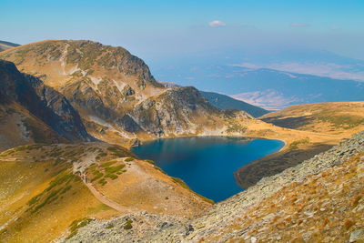 Panoramic view of lake and mountains against sky