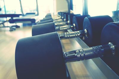 Close-up of chairs and table in cafe