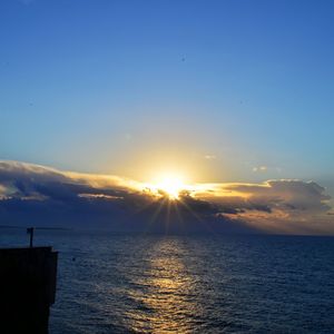 View of calm sea at sunset