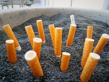 High angle view of cigarette on table