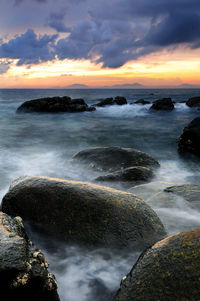 Scenic view of sea against sky during sunset